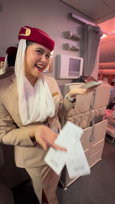 Emirates cabin crew member on board